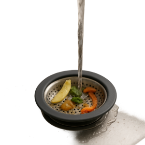 Photo d'un évier moderne équipé d'un bouchon qui retient résidus et graisses. Mise en scène professionnelle soulignant l'efficacité et la facilité d'entretien.